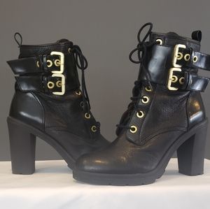 Guess black combat boots with gold hardware